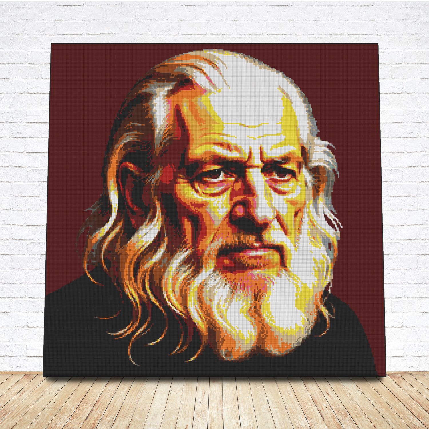 Framed LEGO tile portrait of Leonardo da Vinci on a dark red backdrop
