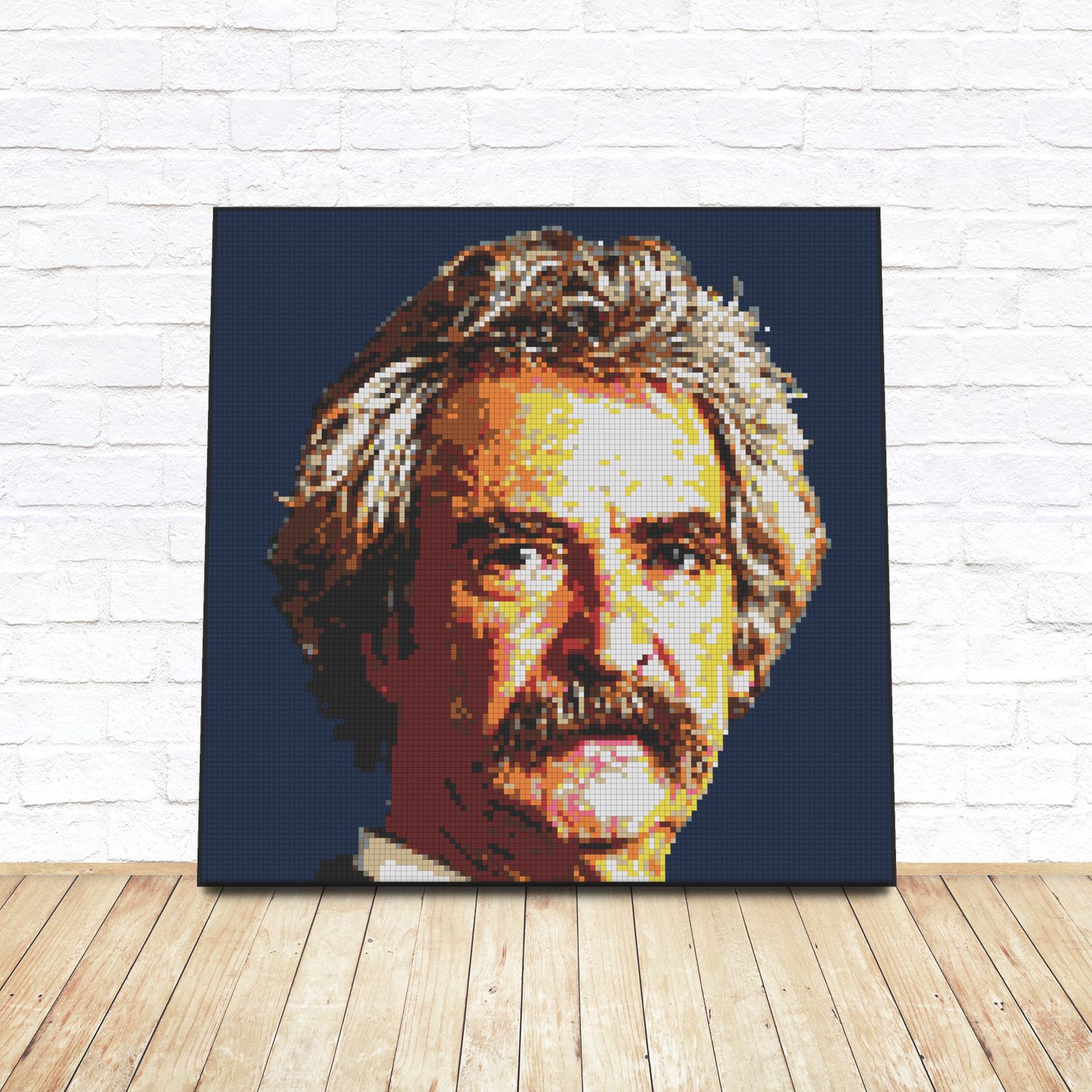 Framed LEGO tile pop-art portrait of Mark Twain leaning against a white brick wall