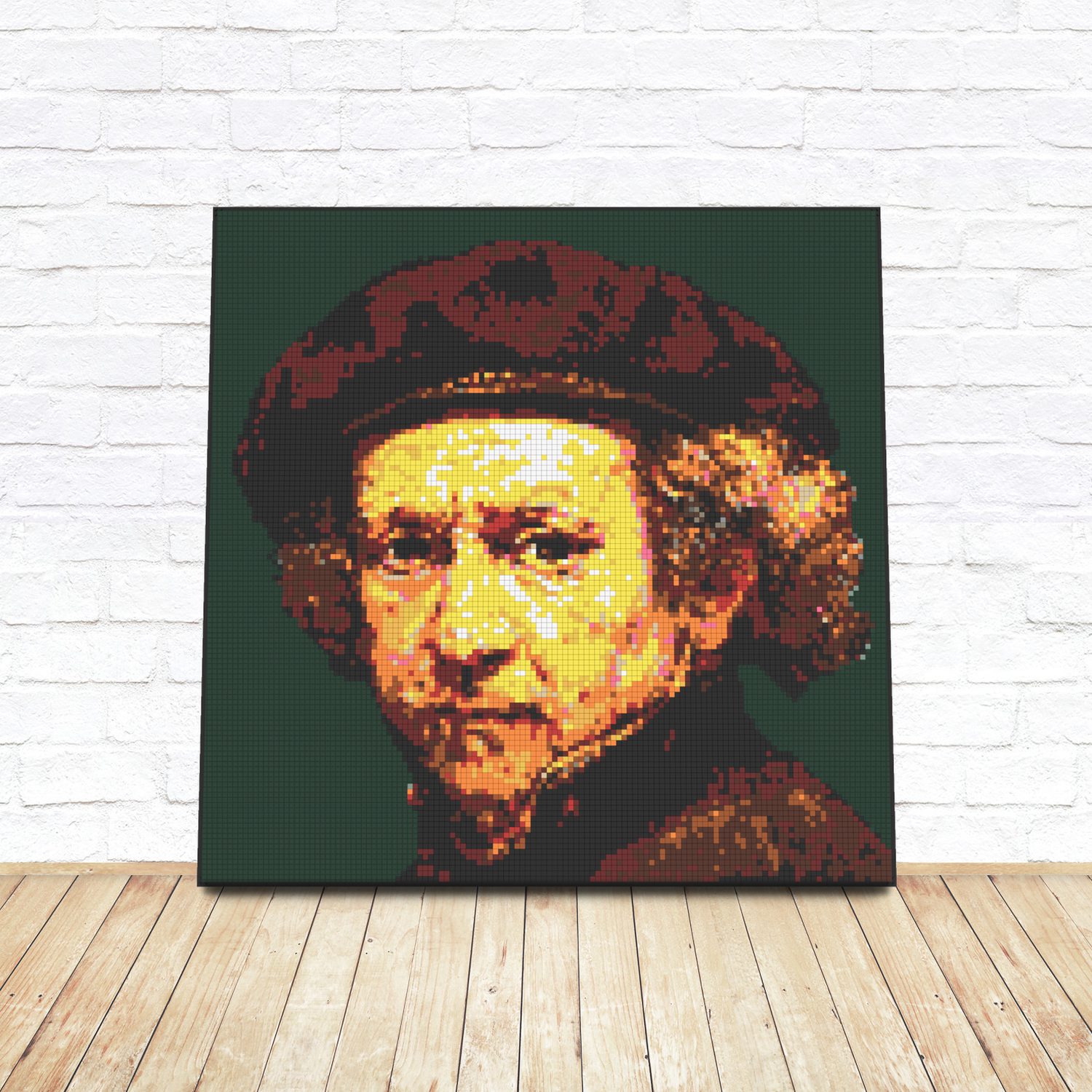 Framed LEGO tile pop-art portrait of Rembrandt leaning against a white brick wall