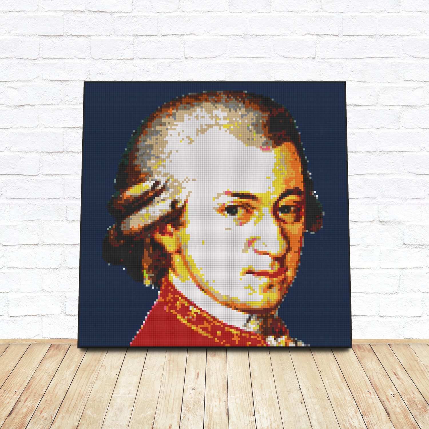 Framed LEGO tile pop-art portrait of Wolfgang Amadeus Mozart leaning against a white brick wall